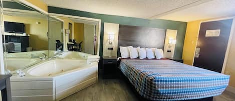 Chambre Standard, 1 trĂšs grand lit, fumeur, bain Ă remous