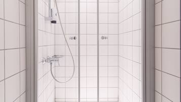 A modern shower with a glass door, white tiled walls, and a towel hanging on the door.