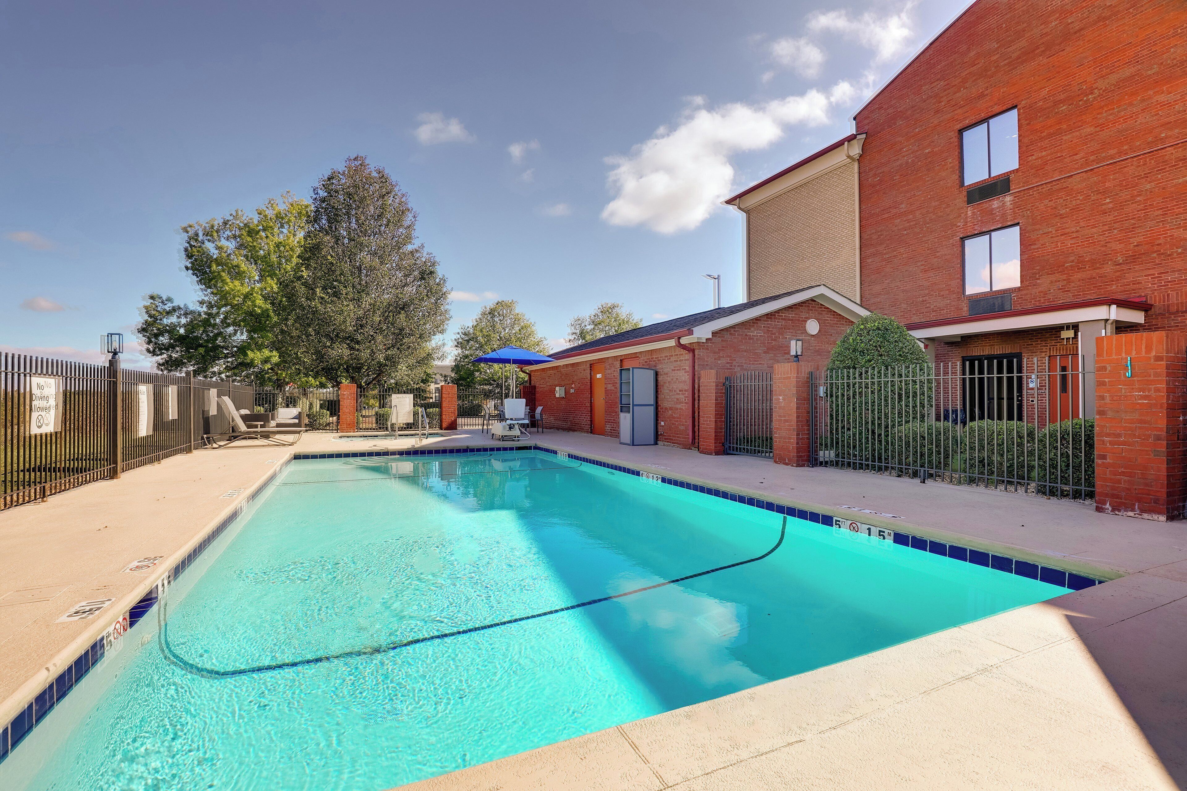 Seasonal outdoor pool, open 9 AM to 9 PM, pool umbrellas, sun loungers