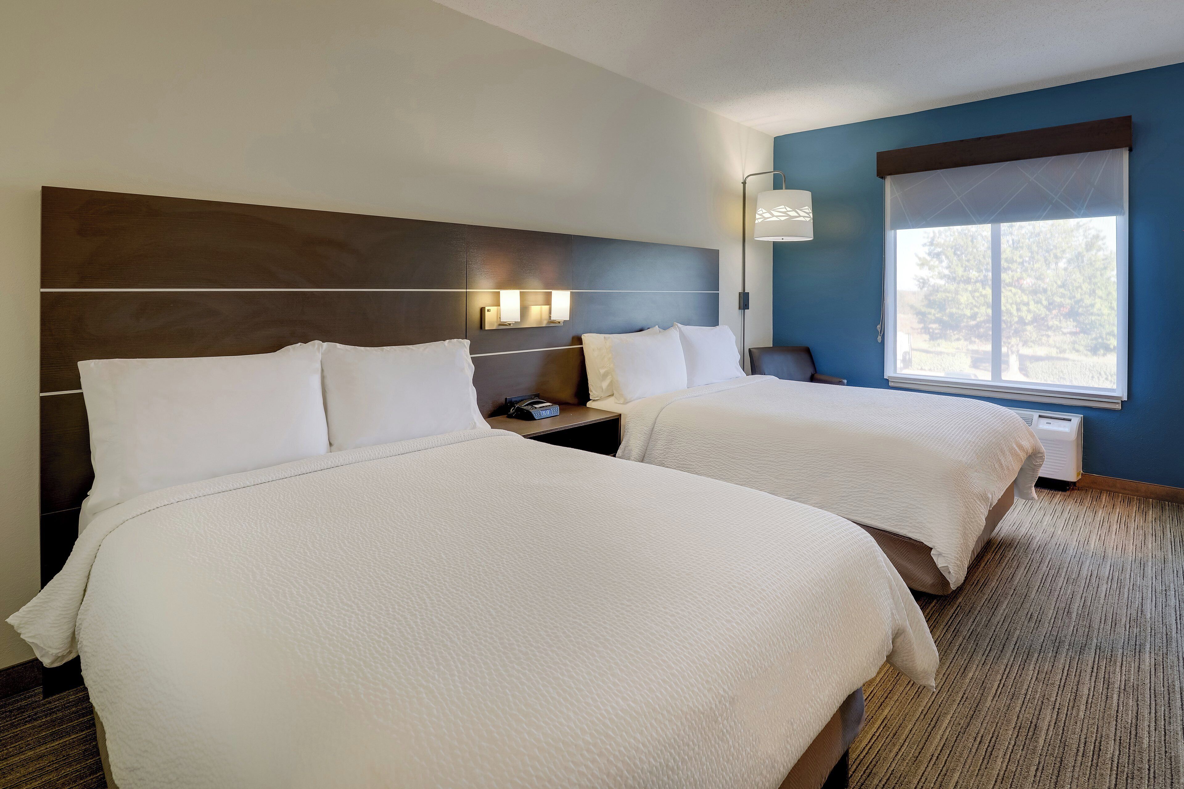 suite, multiple beds | 1 bedroom, desk, laptop workspace, blackout curtains