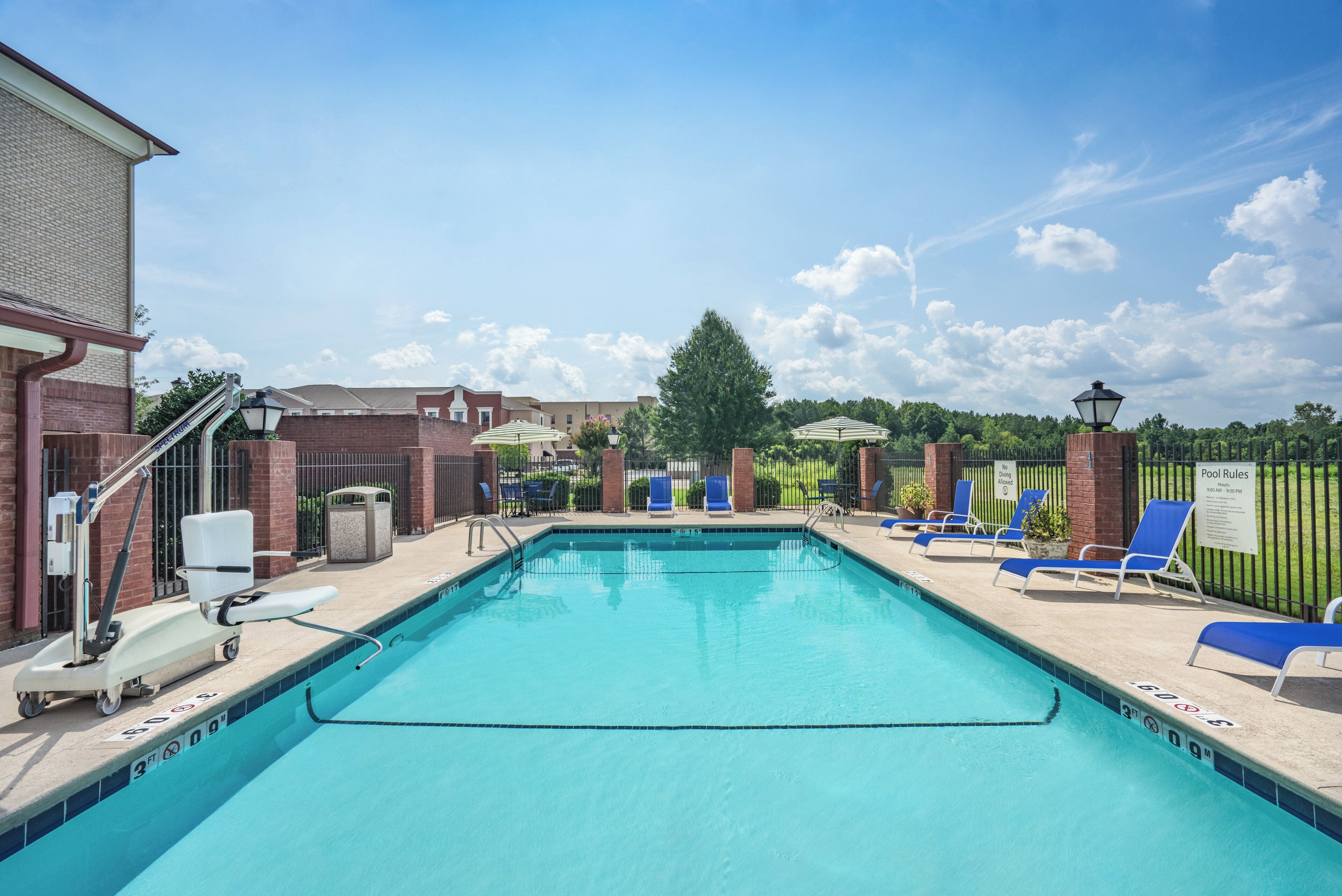 Seasonal outdoor pool, open 9 AM to 9 PM, pool umbrellas, sun loungers