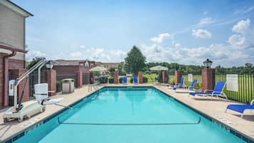 Seasonal outdoor pool, open 9 AM to 9 PM, pool umbrellas, sun loungers
