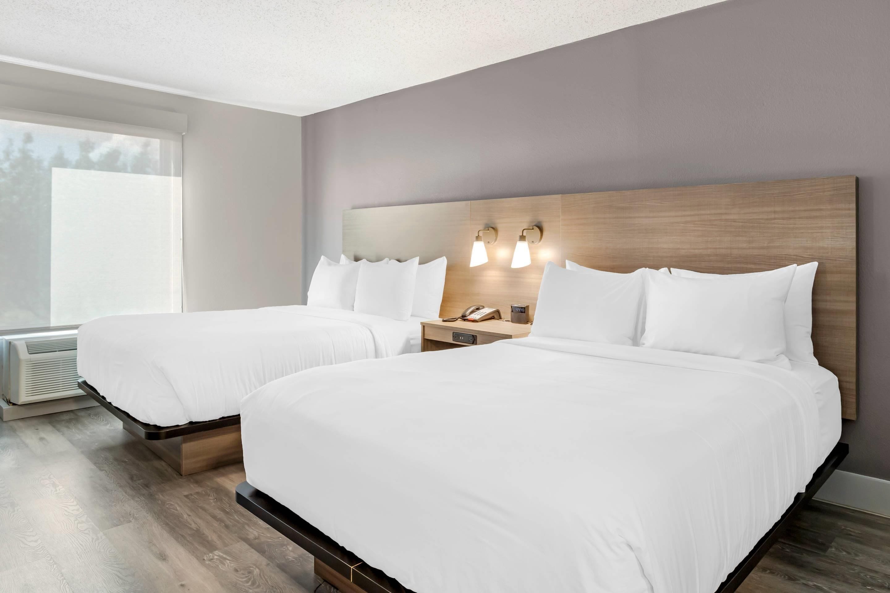 Standard Room, 2 Queen Beds, Non Smoking | Tempur-Pedic beds, desk, laptop workspace, blackout drapes