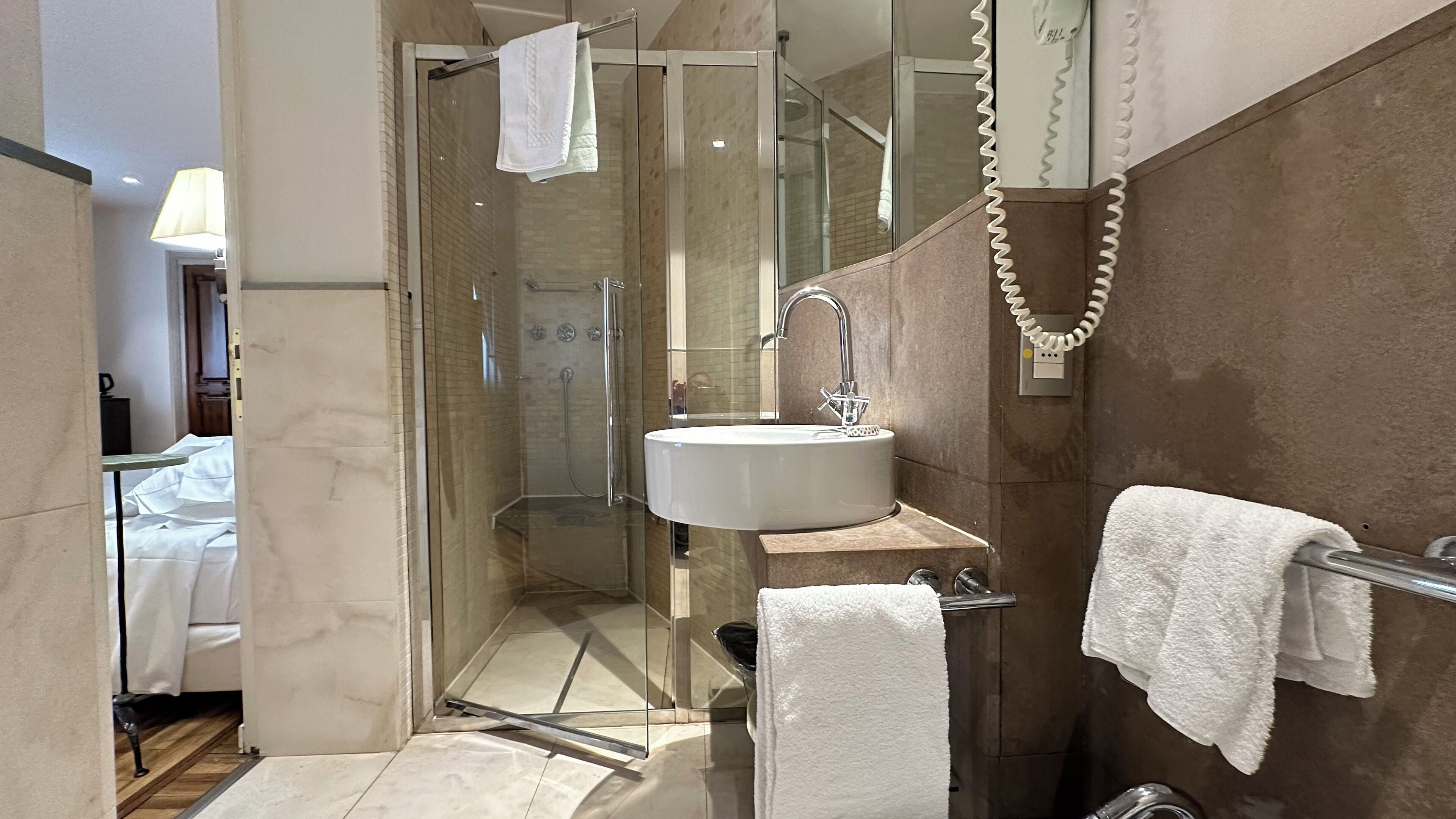 junior suite, terrace, canal view | bathroom | rainfall showerhead, hair dryer, slippers, bidet