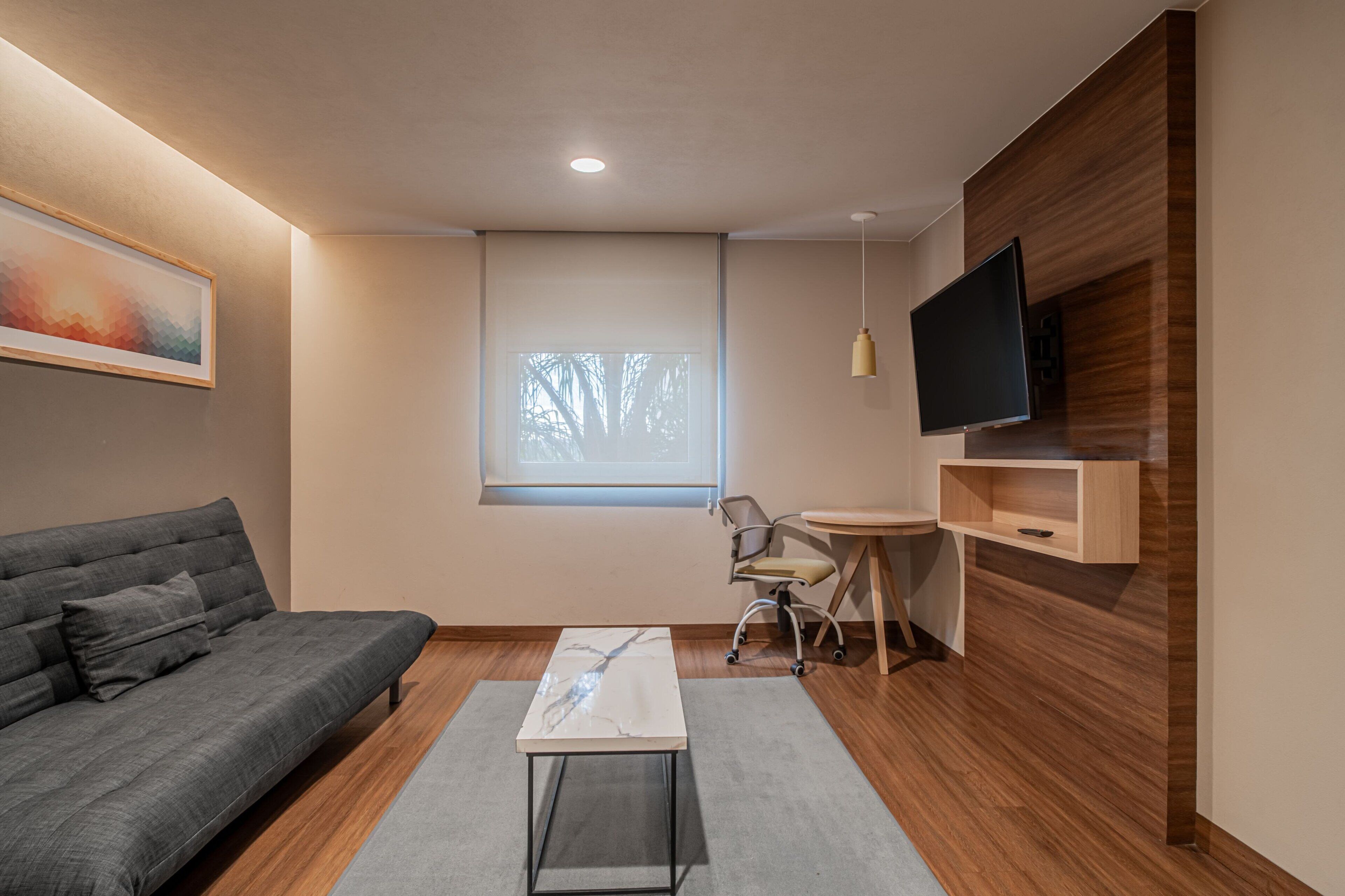 junior suite, 2 double beds, non smoking | living room | 37-inch lcd tv with cable channels, tv