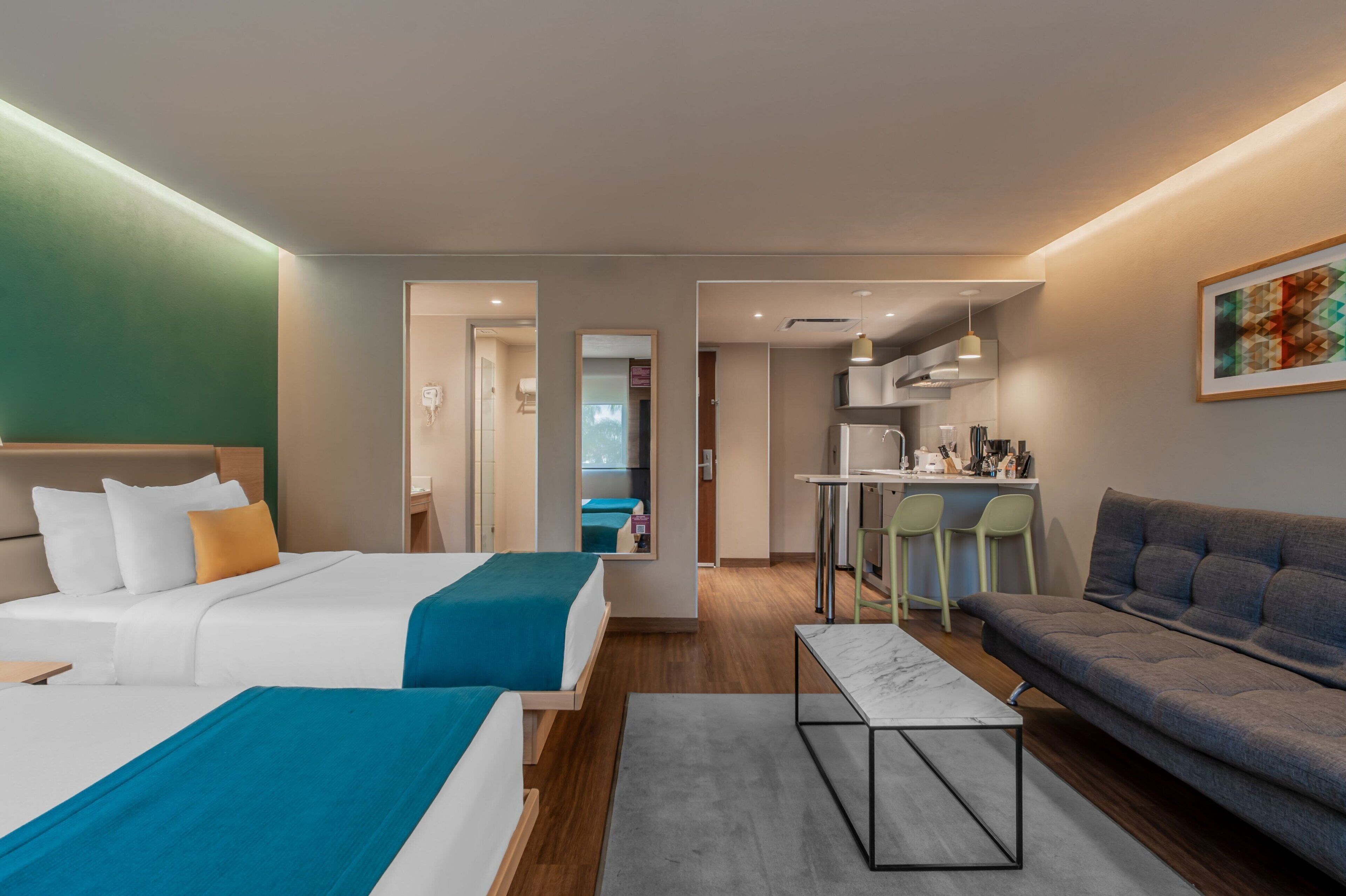 Suite, 2 Double Beds | Minibar, in-room safe, desk, laptop workspace