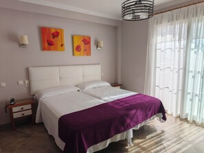 Superior Double Room, Sea View | Minibar, in-room safe, individually decorated, individually furnished
