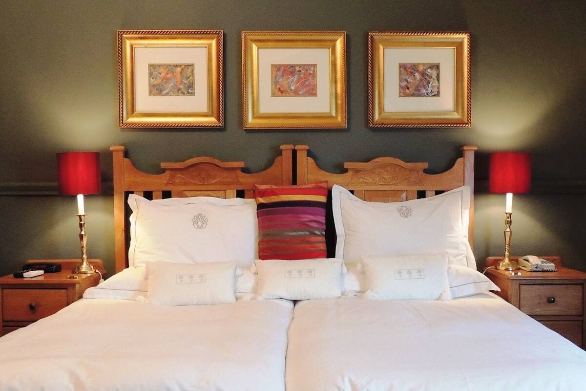 Deluxe Room | Egyptian cotton sheets, down comforters, in-room safe