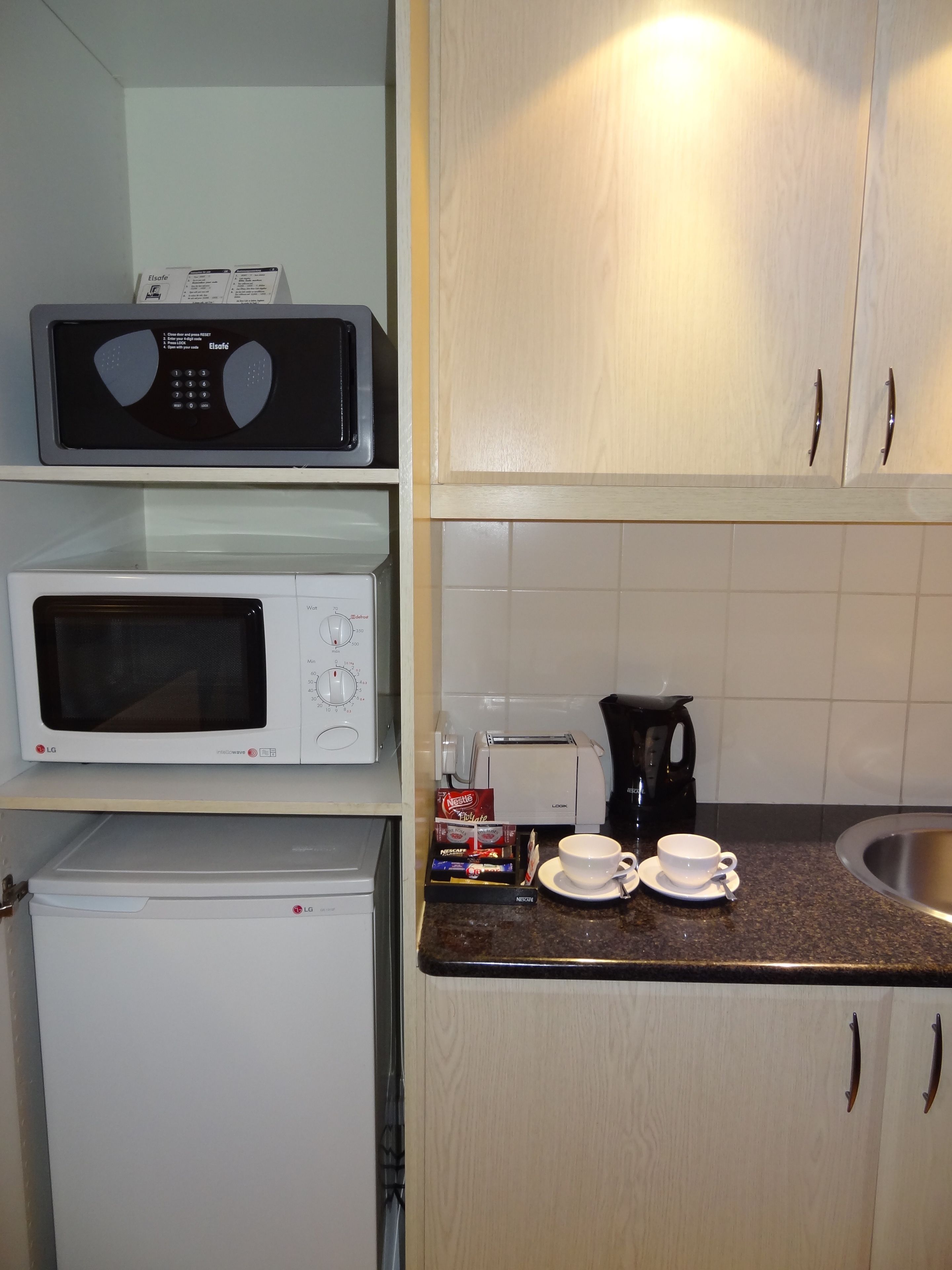 microwave, electric kettle, cookware/dishes/utensils