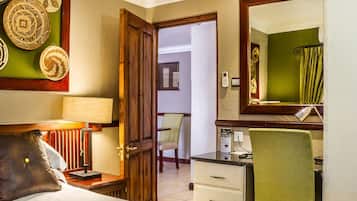 Executive Suite | Down duvets, minibar, in-room safe, desk