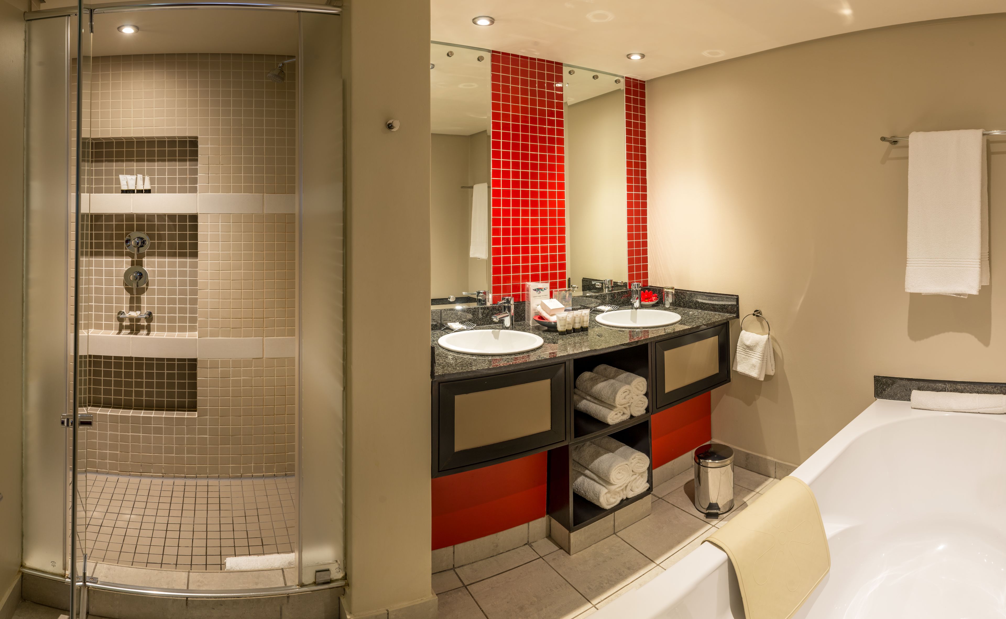 separate bathtub and shower, designer toiletries, hair dryer, towels