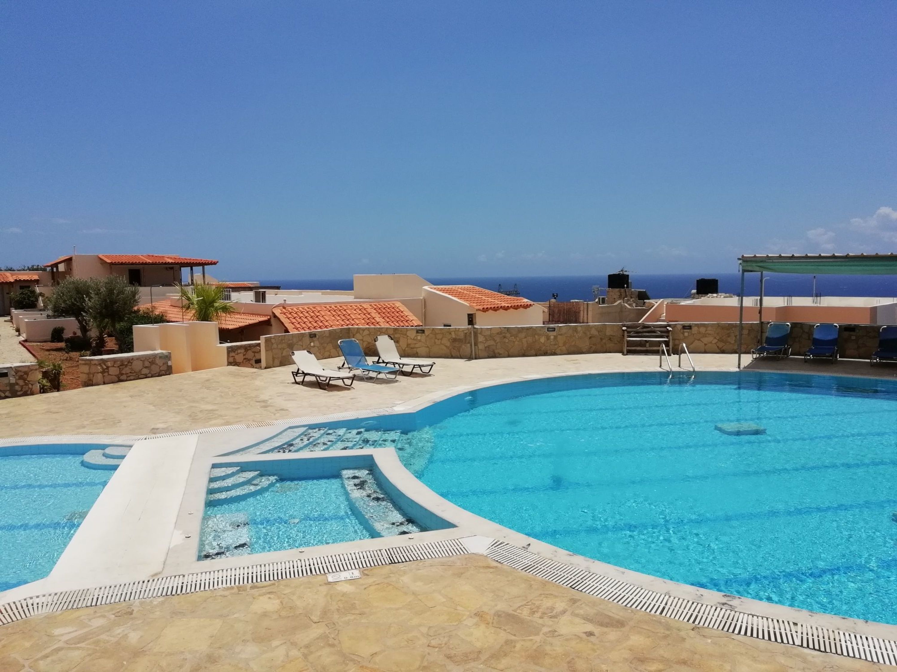 outdoor pool, pool loungers