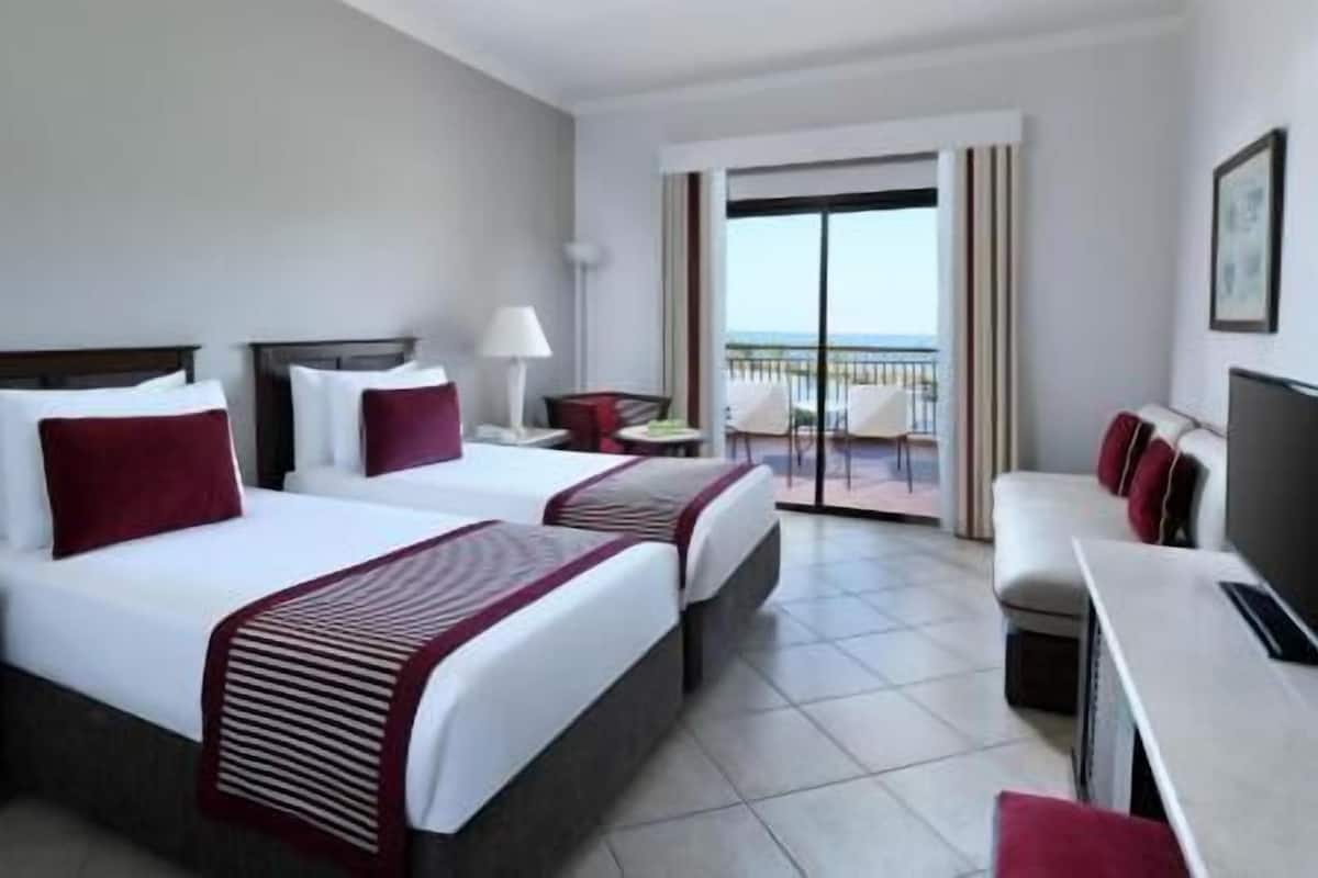 In-room safe, blackout drapes, bed sheets