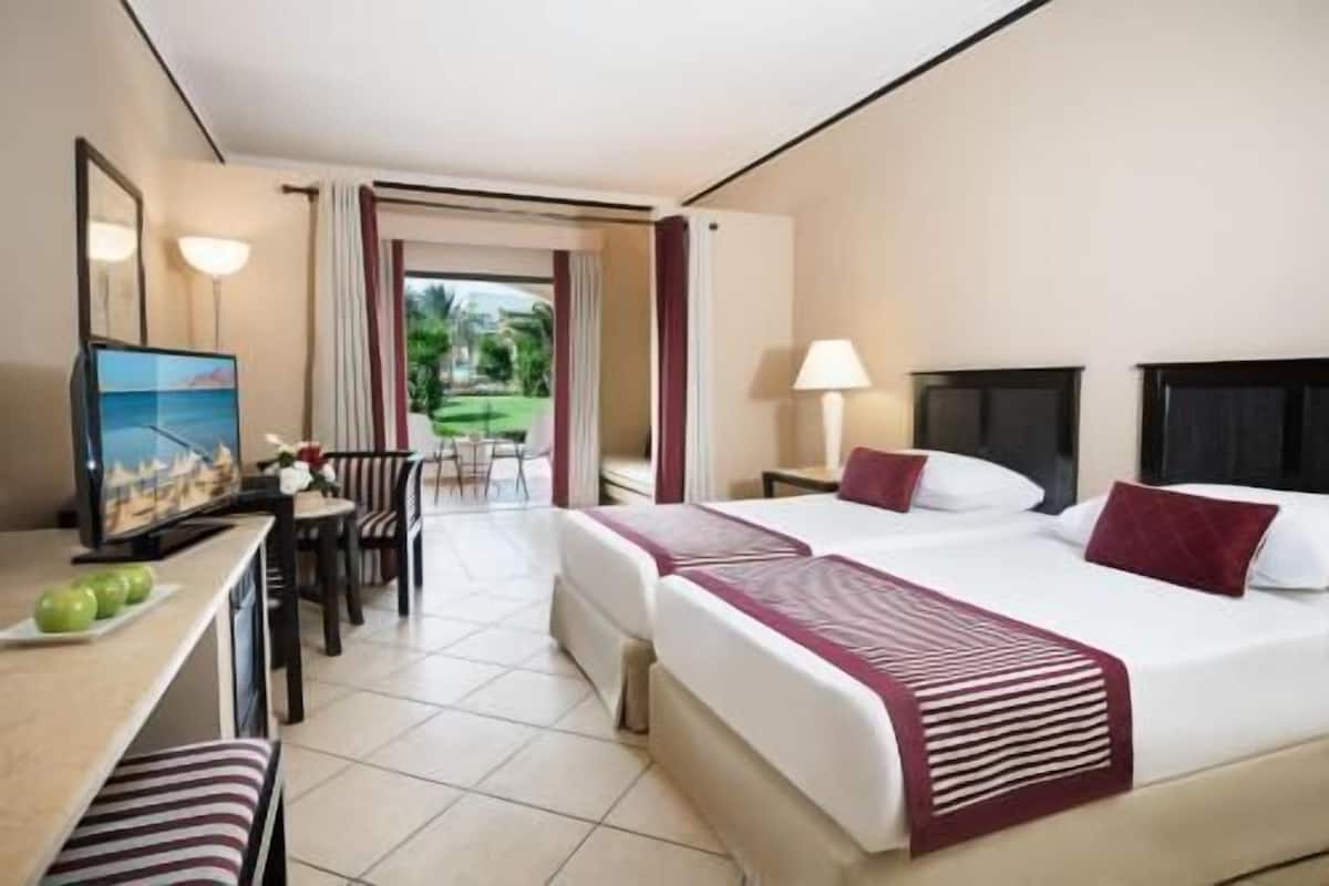 In-room safe, blackout drapes, bed sheets