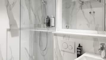 Shower, eco-friendly toiletries, hair dryer, towels