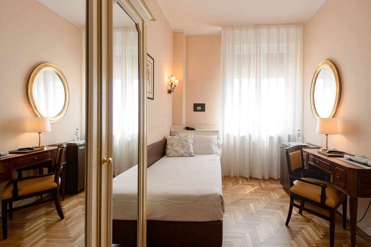 Single Room | Minibar, in-room safe, desk, iron/ironing board (on request)