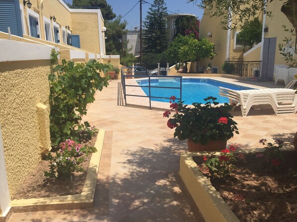 Outdoor pool, pool umbrellas, pool loungers