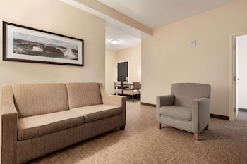 Premium Suite, Multiple Beds, Accessible | Premium bedding, desk, blackout drapes, iron/ironing board at Wyndham Garden Niagara Falls Fallsview
