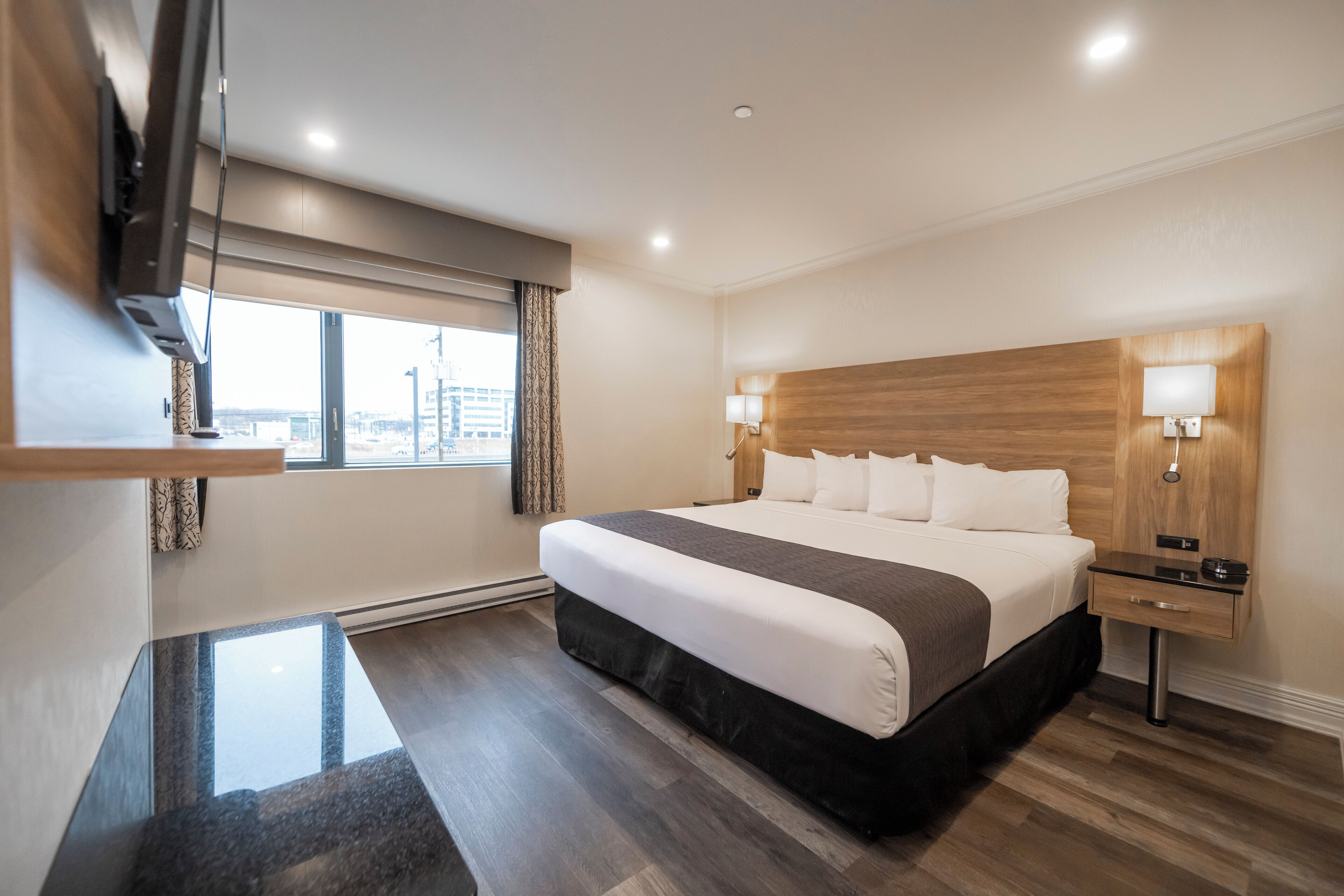 Suite, 1 King Bed | Desk, blackout drapes, iron/ironing board, free WiFi