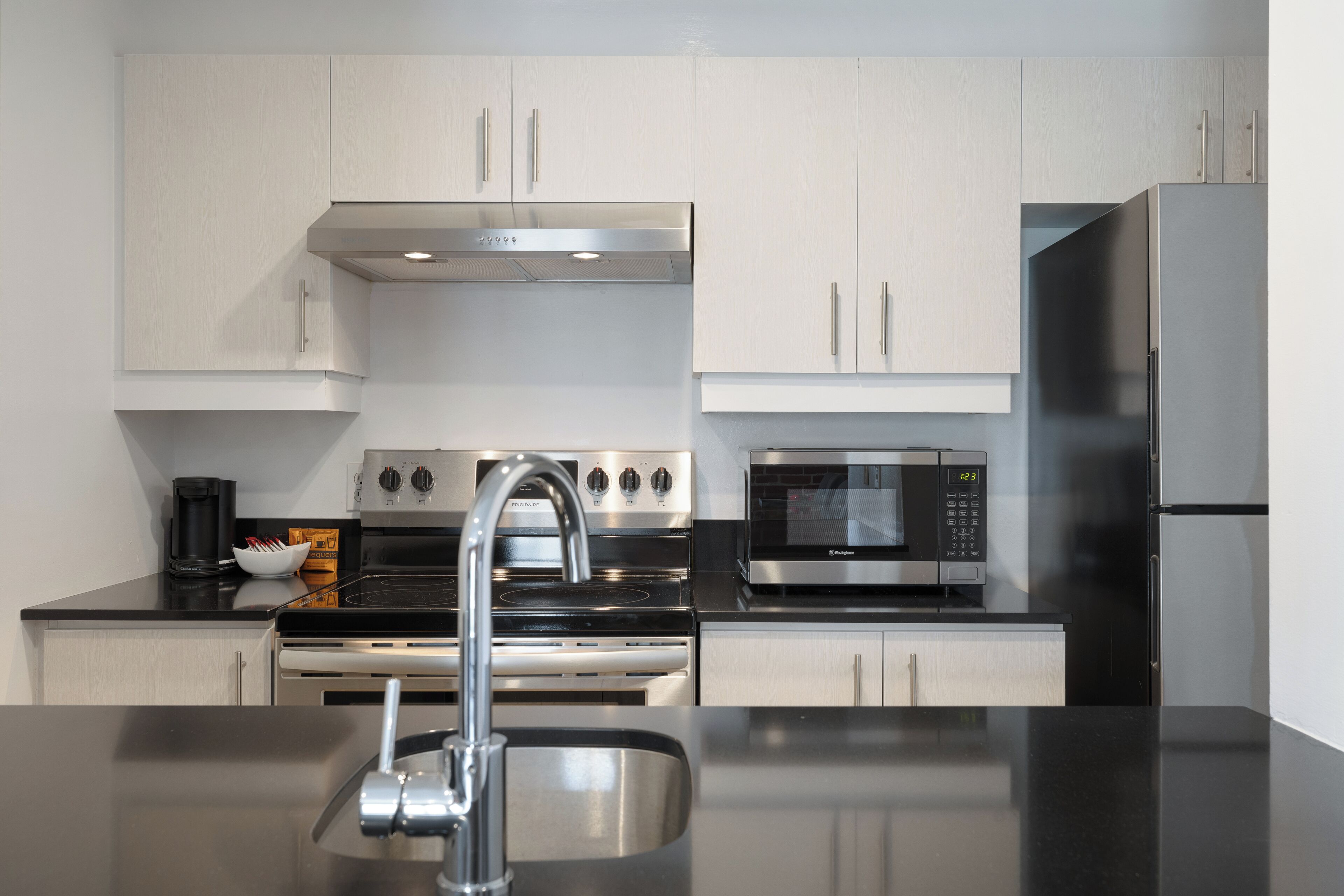 superior suite, 1 king bed with 1 queen murphy bed (no pet allowed) | private kitchen | mini-fridge, microwave, stovetop, coffee/tea maker