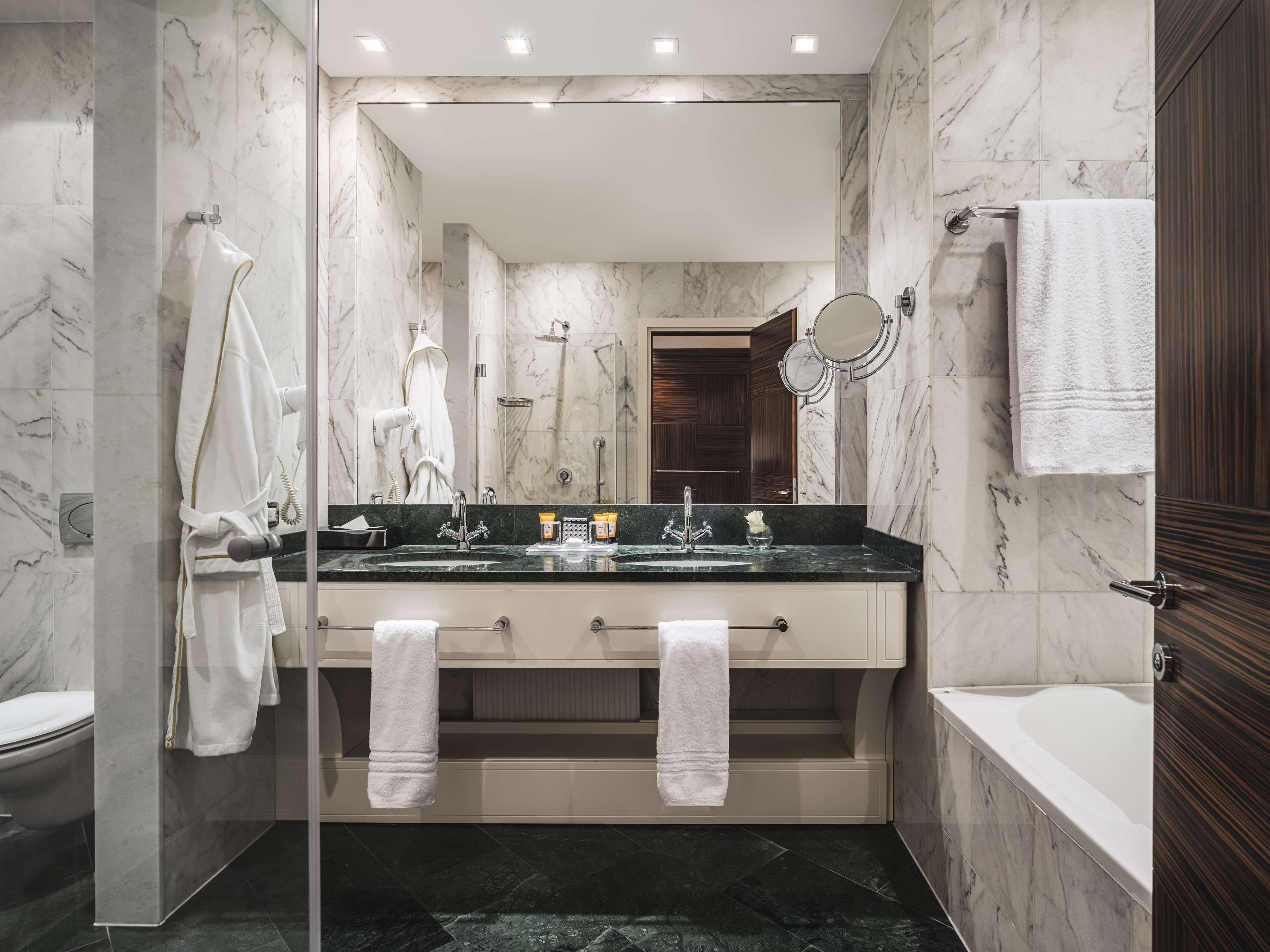 combined shower/bathtub, eco-friendly toiletries, hair dryer, bathrobes