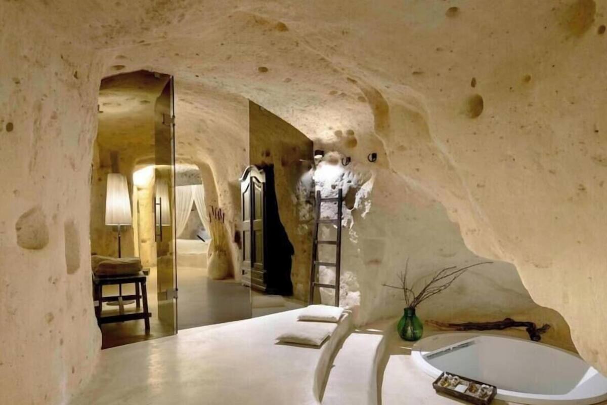 Bathroom | Rainfall showerhead, free toiletries, hair dryer, bathrobes