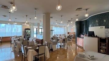 Breakfast, lunch, dinner served; local cuisine