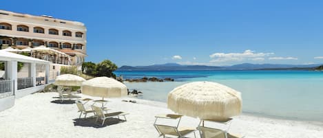 Private beach, white sand, sun-loungers, beach umbrellas