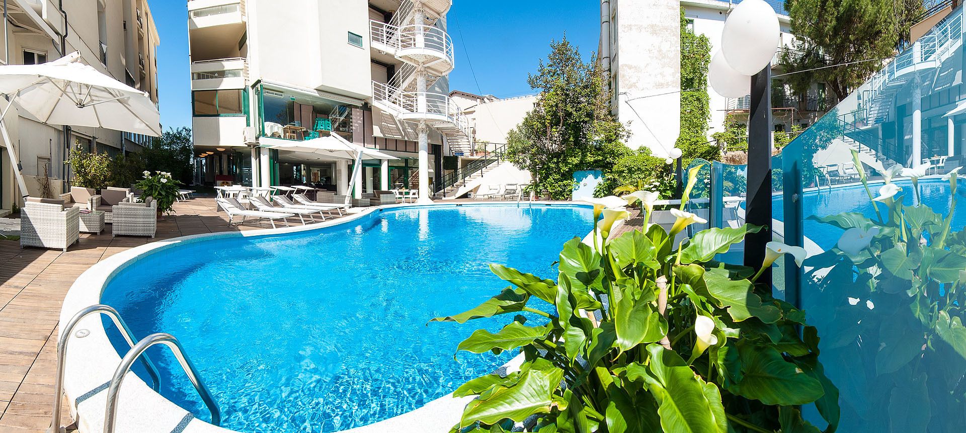 seasonal outdoor pool, pool umbrellas, pool loungers