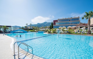 Seasonal outdoor pool, open 10:00 AM to 7:30 PM, pool loungers