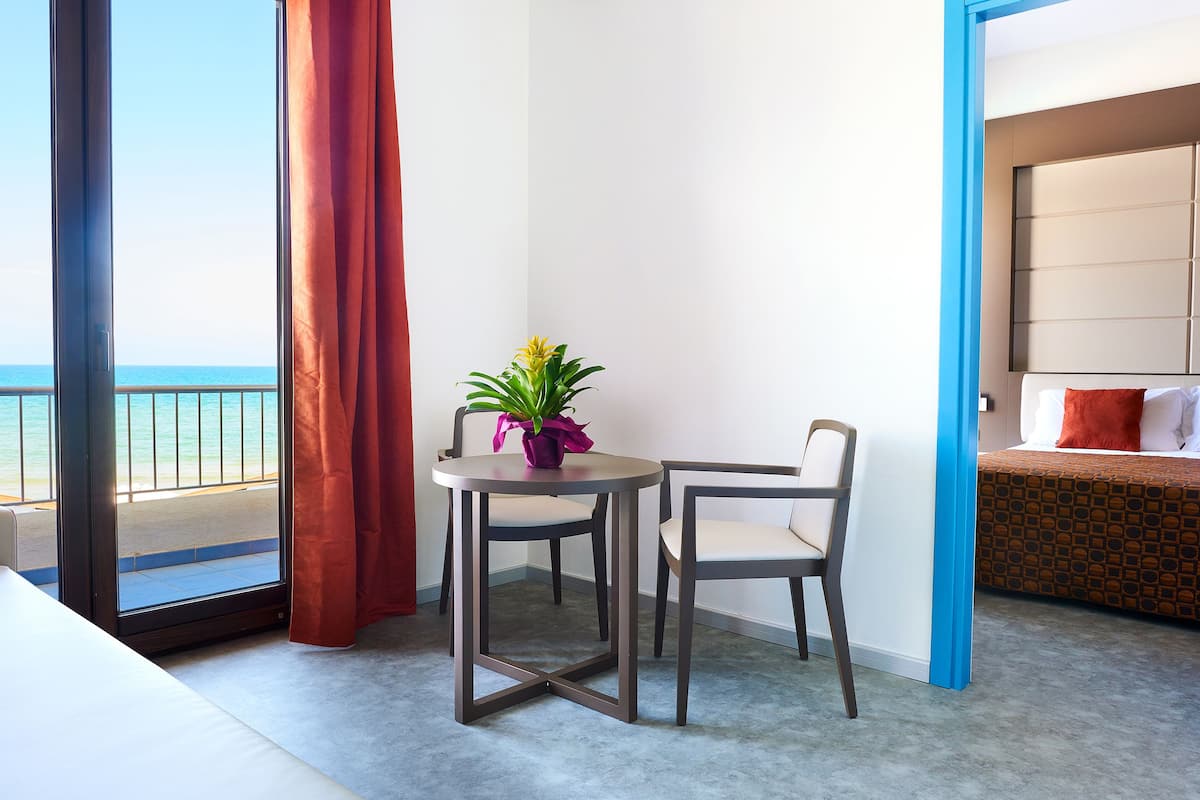 Deluxe Suite, Sea View, Beachfront | Minibar, in-room safe, individually decorated, individually furnished