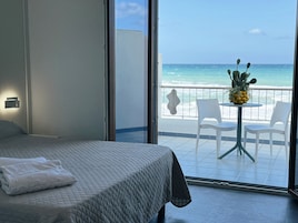 Deluxe Double or Twin Room, Sea View | Free minibar, in-room safe, individually decorated