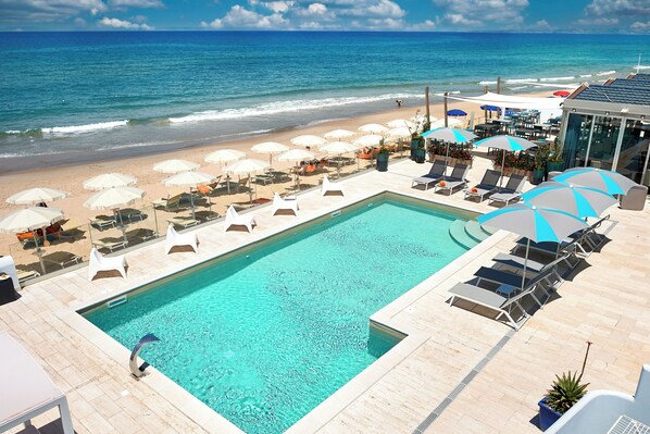 Outdoor pool, pool umbrellas, pool loungers