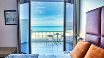 Deluxe Double or Twin Room, Sea View | Minibar, in-room safe, individually decorated, individually furnished
