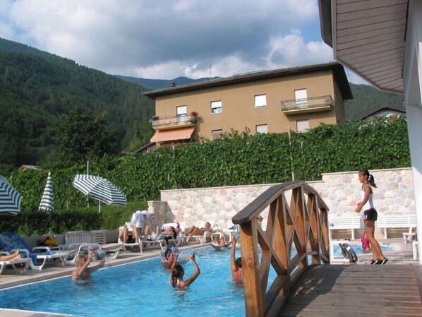 Outdoor pool, pool umbrellas, pool loungers