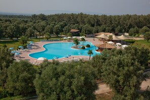 Seasonal outdoor pool, pool umbrellas, pool loungers
