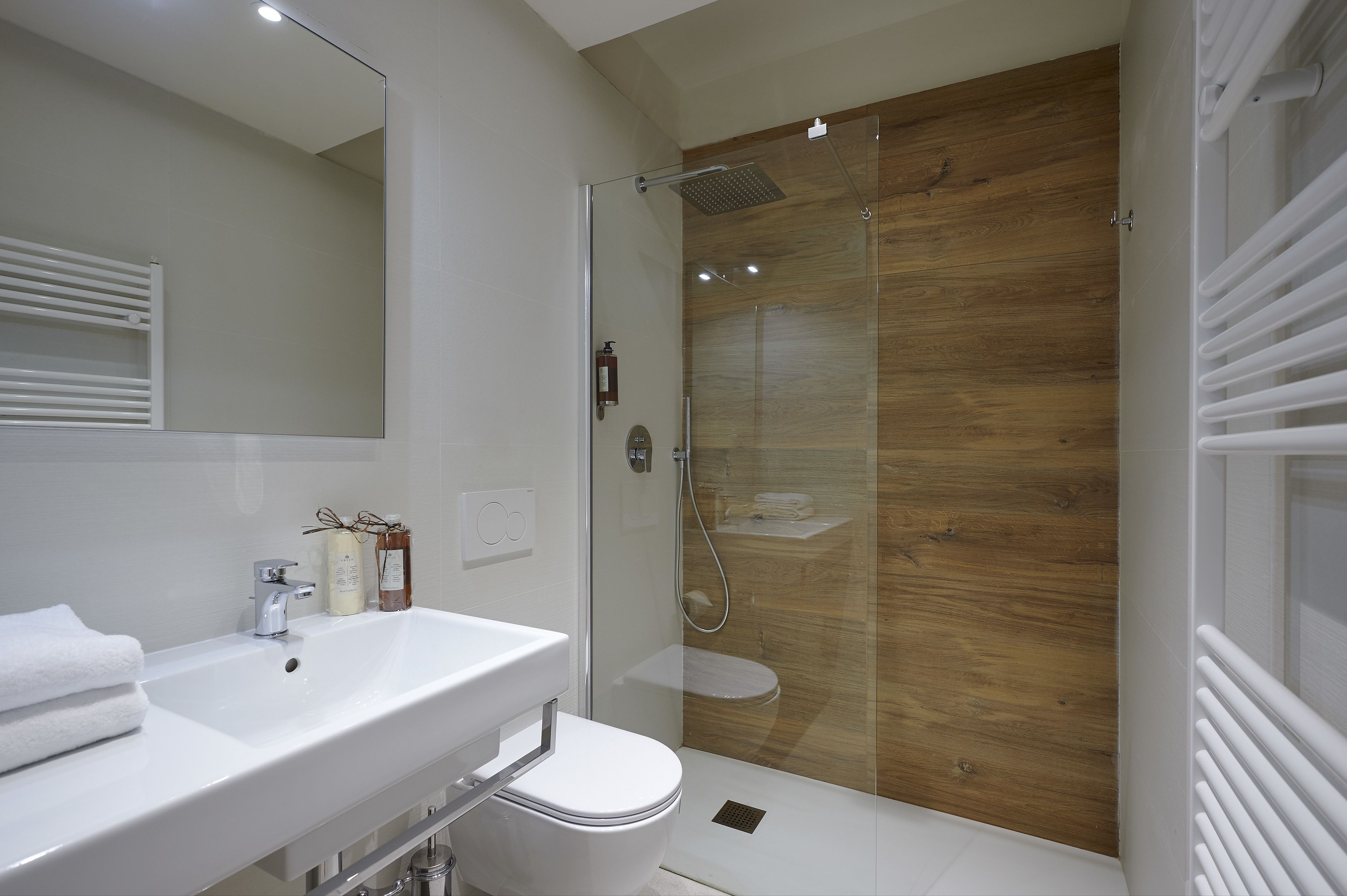 superior double room | bathroom | shower, rainfall showerhead, eco-friendly toiletries, hair dryer