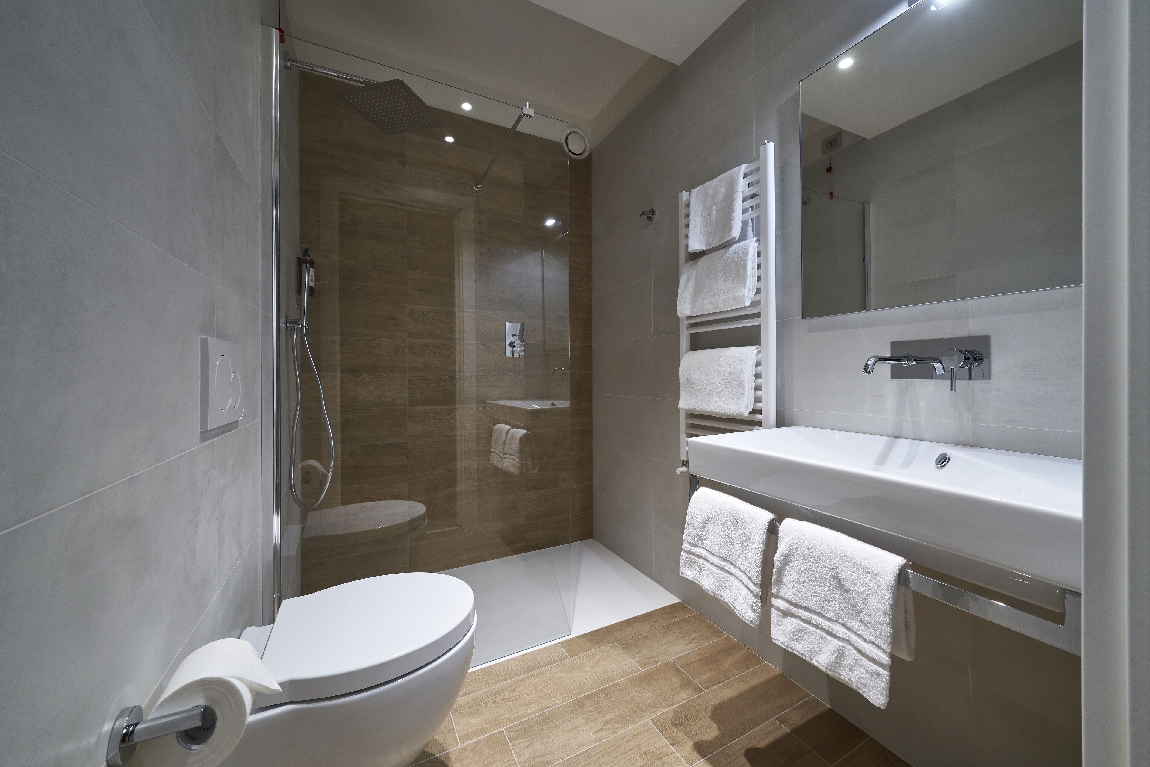 standard double room | bathroom | shower, rainfall showerhead, eco-friendly toiletries, hair dryer