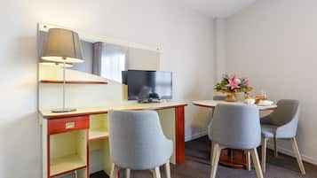 One-Bedroom Apartment | Living area | LCD TV