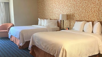 Premium bedding, desk, laptop workspace, iron/ironing board