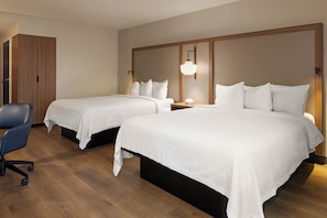 Premium bedding, desk, laptop workspace, iron/ironing board