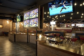 20 bars/lounges, swim-up bar, poolside bar