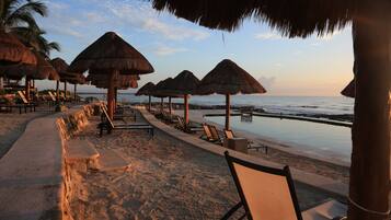Private beach, white sand, sun-loungers, beach umbrellas
