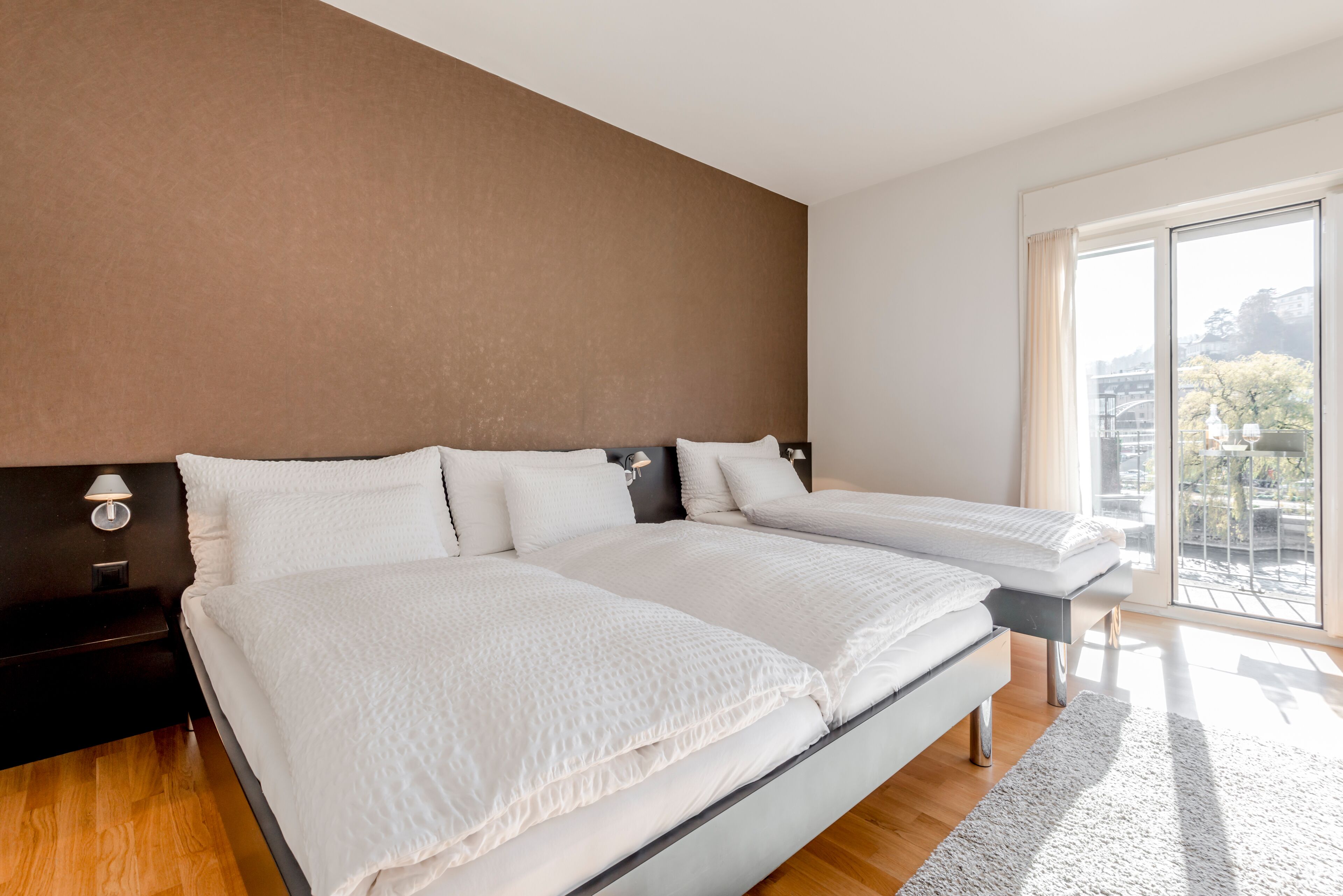 triple room, balcony, river view | 1 bedroom, in-room safe, desk, iron/ironing board