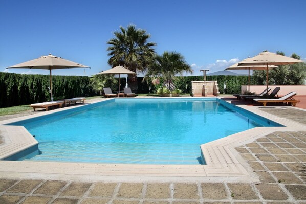 Outdoor pool, pool umbrellas, pool loungers