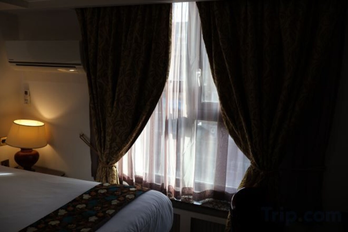 Desk, blackout drapes, iron/ironing board, WiFi (free)
