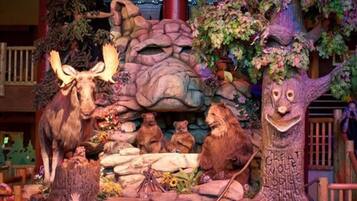 A wildlife scene with a moose, bears, and a tree labeled "Great Wolf Lodge".