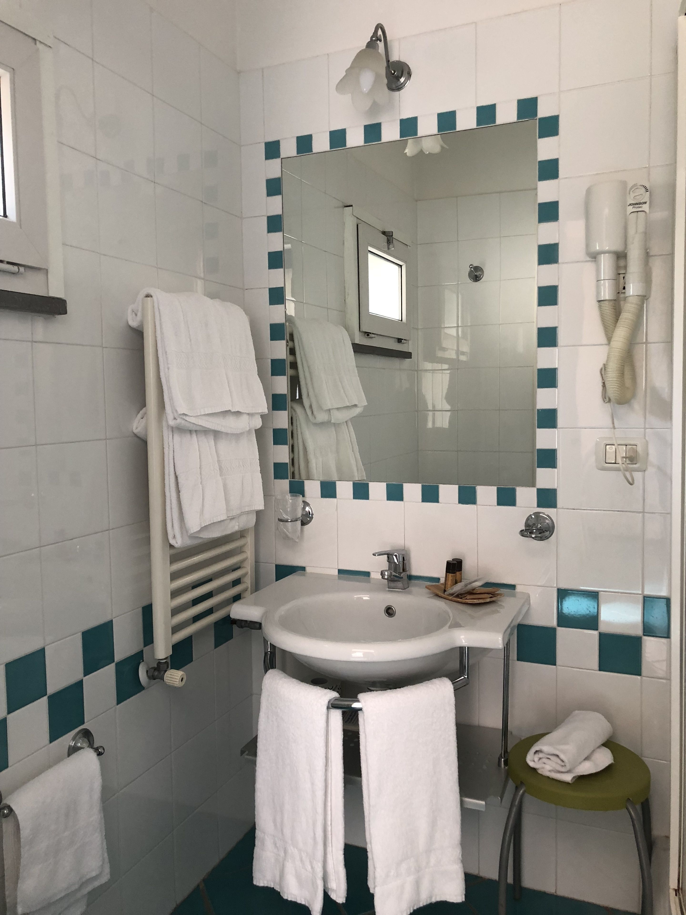 free toiletries, hair dryer, bidet, towels