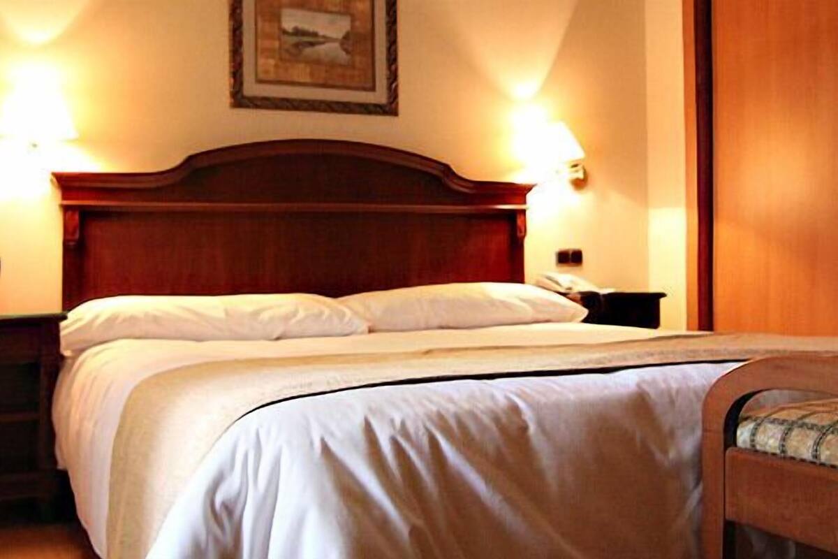 in-room safe, desk, blackout curtains, rollaway beds