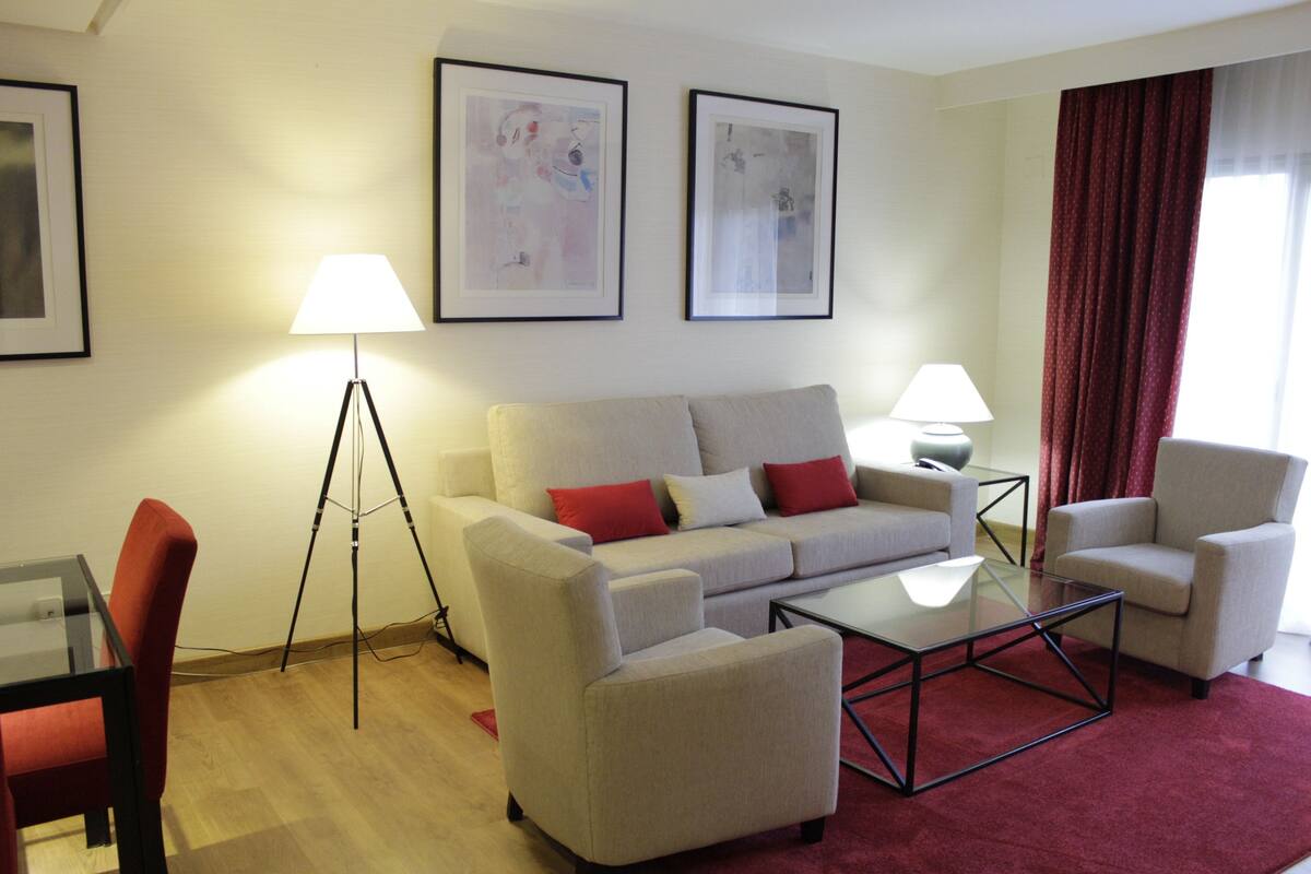 Apartment, 1 Bedroom | Living area | Flat-screen TV